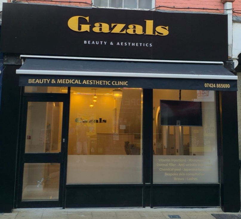 Gazals shopfront with black awning and gold signage in Ipswich